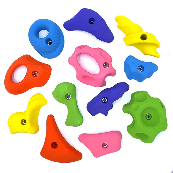 Colorful rock wall holds for kids in various shapes and bright colors for climbing fun
