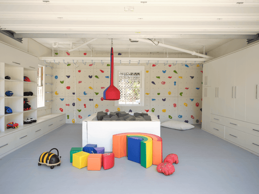 While Everyone Else Turned Their Garages Into Guest Rooms, This Mom Put Monkey Bars in Hers