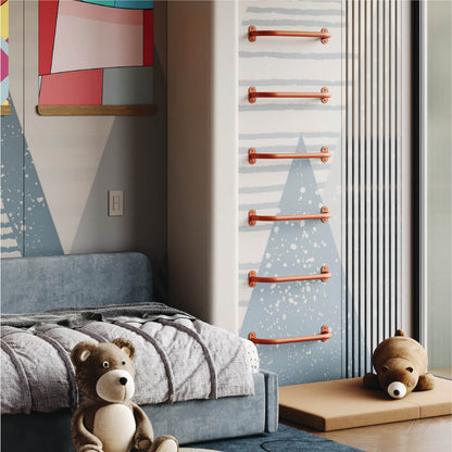 Children's bedroom with a bed, teddy bears, and wall decorations.