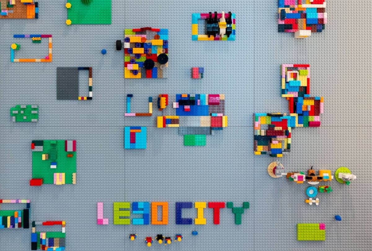 Colorful LEGO creations on a brick building board for kids, showcasing creativity and engineering skills