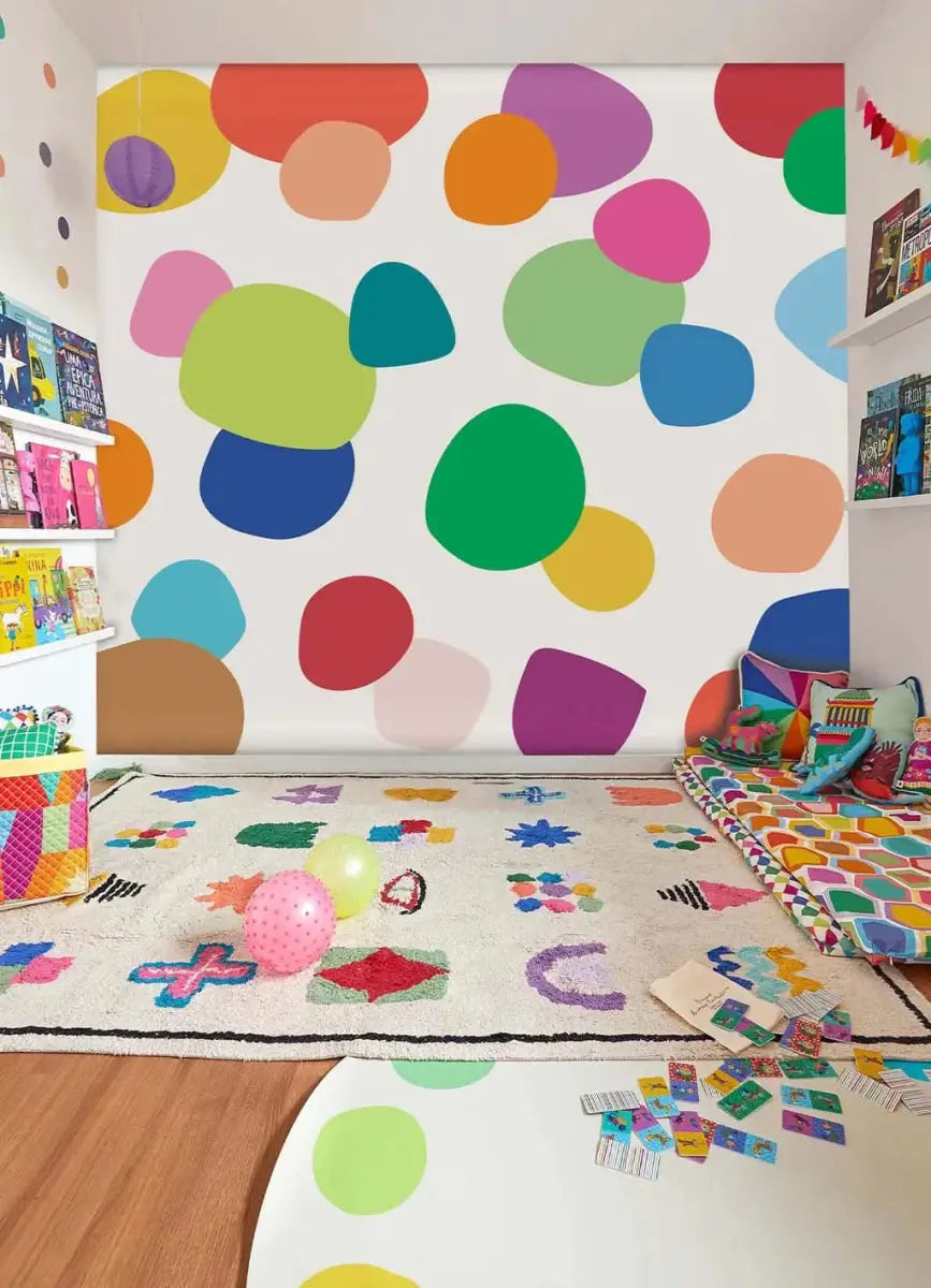 Colorful dots wallpaper for playroom featuring vibrant shapes on a white background