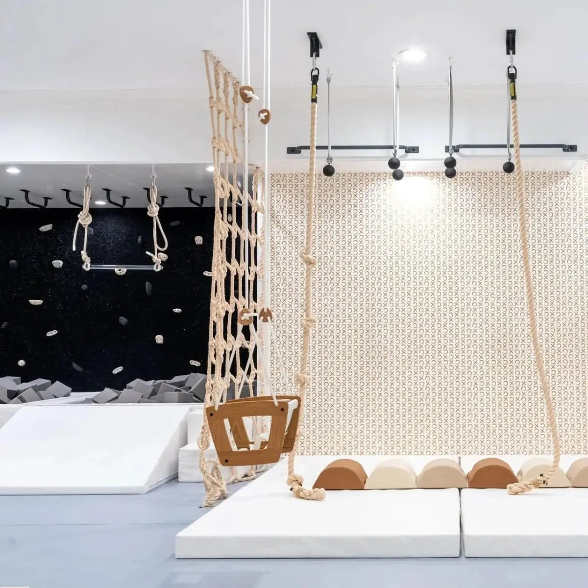 Custom playroom design request with climbing wall, swing, and soft flooring for children's play areas