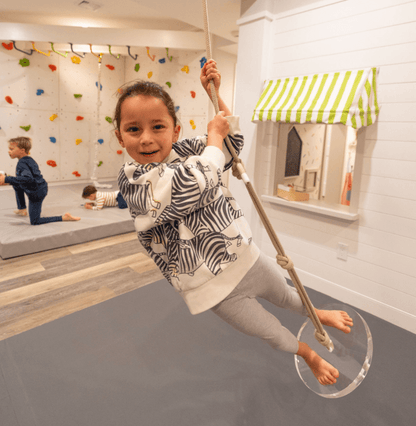 Gabriela designer indoor swing for kids in a playroom, enhancing fun and active play