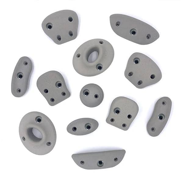 JZN designer rock wall hold set featuring various textured shapes for indoor climbing workouts