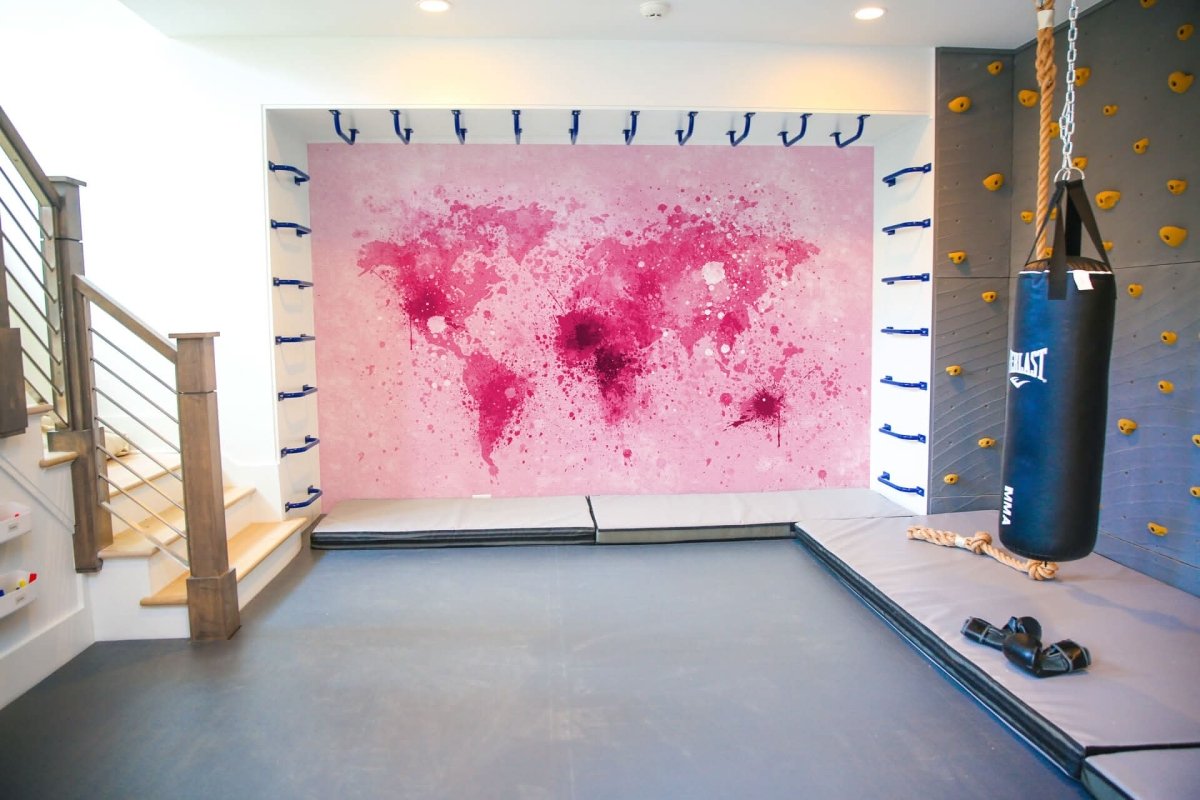 Educational world map wallpaper in pink tones for colorful and engaging room decor