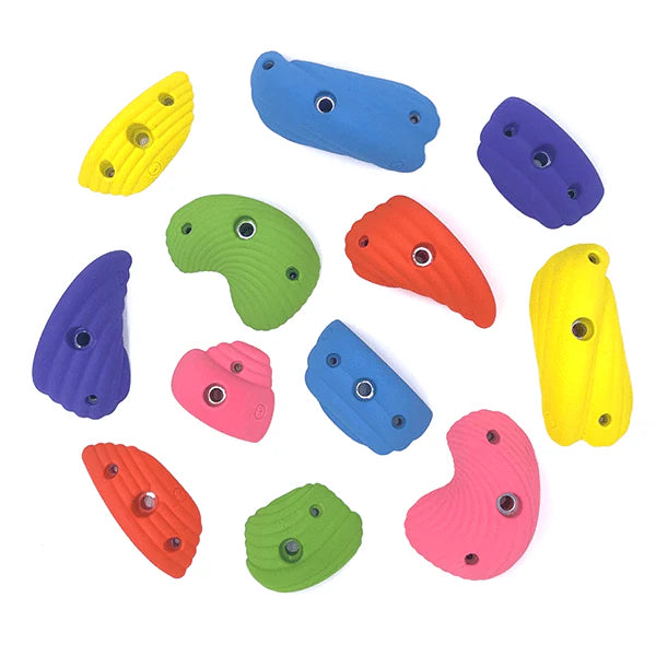 Colorful rock wall holds for playroom with various shapes and vibrant colors for active play