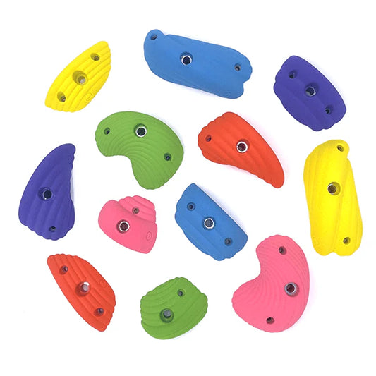 Colorful rock wall holds for playroom with various shapes and vibrant colors for active play