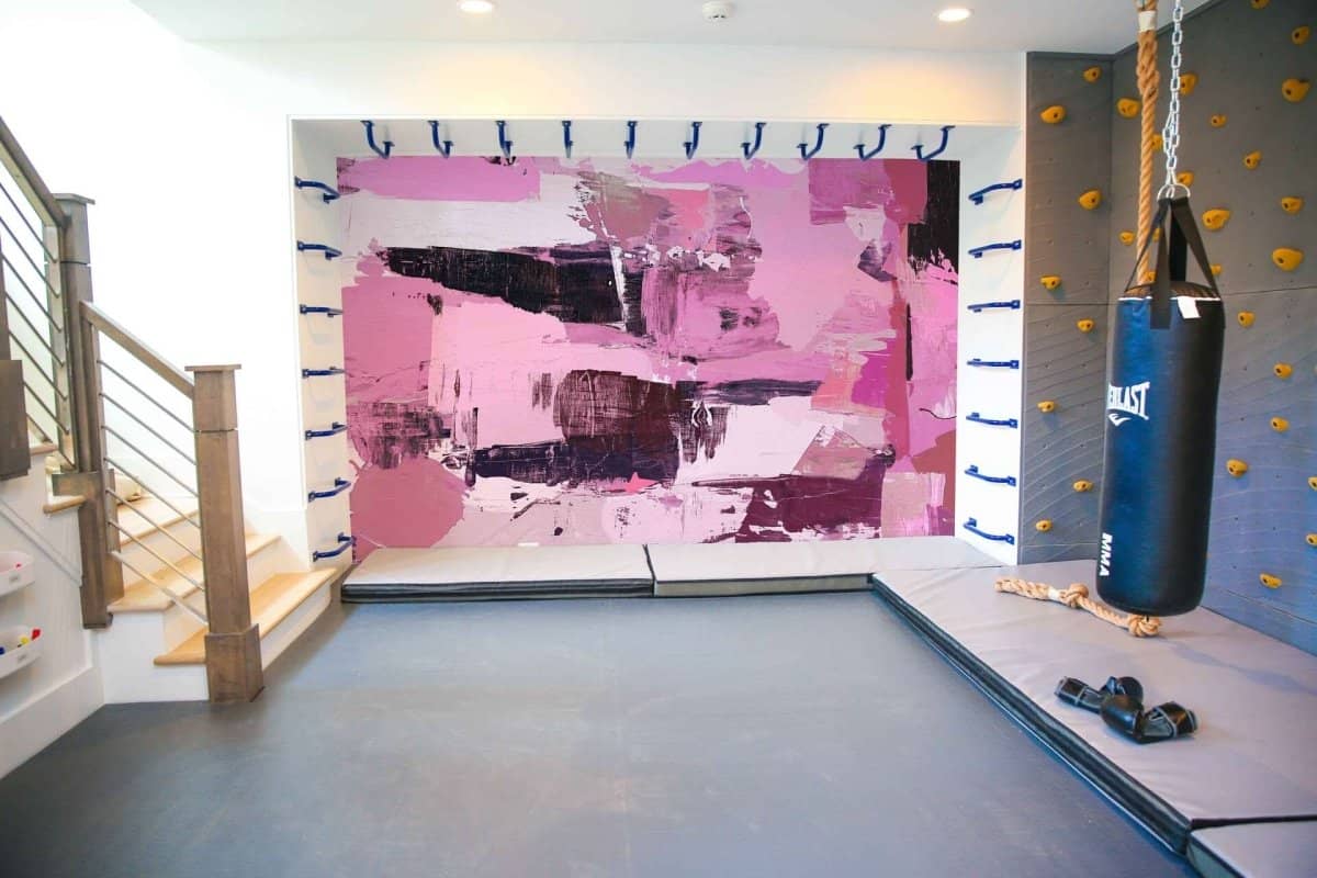 Cara Saven Fixture Wallpaper for Playrooms featuring a vibrant abstract design on a feature wall