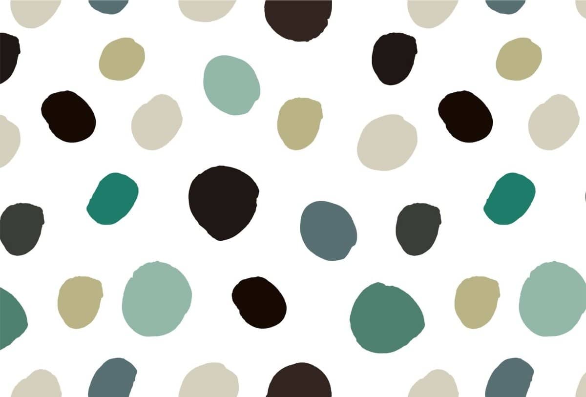 Montessori inspired wallpaper with colorful dots on a white background for children's rooms