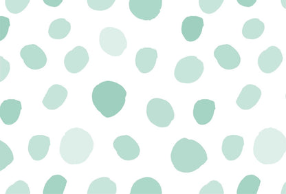 Cara Saven Montessori inspired wallpaper with soft green polka dot pattern on a white background