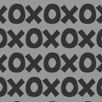 Sur La Mur Montessori playroom wallpaper featuring a modern x and o pattern in black and gray