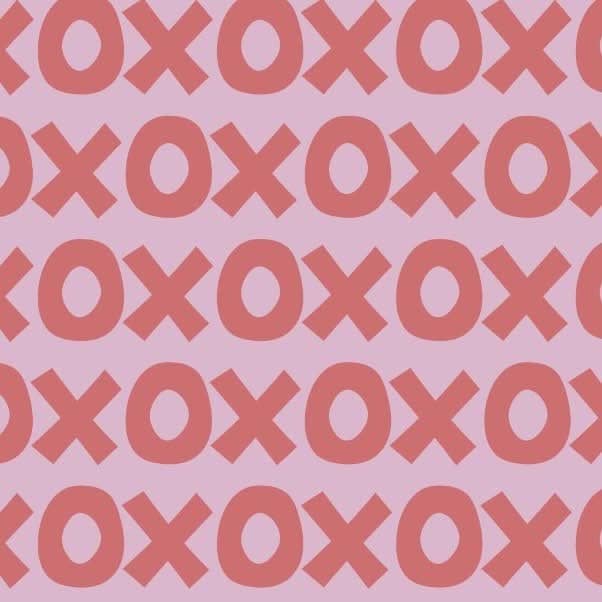Montessori playroom wallpaper featuring a playful pattern of pink and coral X's and O's