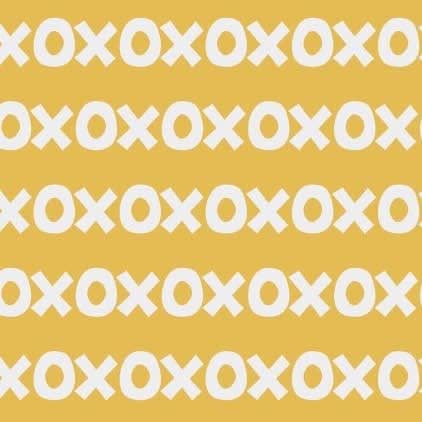 Sur La Mur Montessori wallpaper for playroom with playful x and o pattern on a yellow background