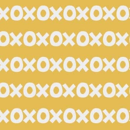 Sur La Mur Montessori wallpaper for playroom with playful x and o pattern on a yellow background