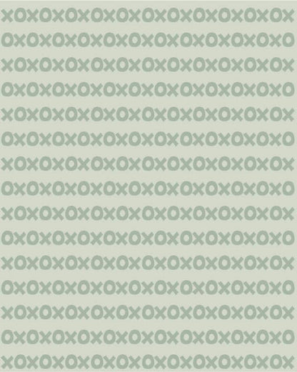 Sur La Mur Montessori wallpaper for playroom featuring a playful green and white pattern of Xs and Os