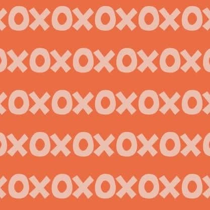 Sur La Mur Montessori wallpaper for playroom with playful X and O pattern in orange and light tones