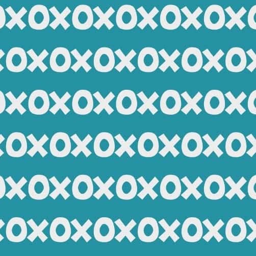 Sur La Mur Montessori wallpaper for playroom featuring a playful X and O design in teal and white