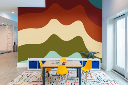 Modern Montessori wallpaper for playrooms featuring vibrant wavy patterns in earthy tones