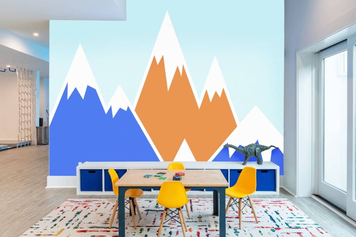Mountain playroom wallpaper featuring colorful mountains in blue, orange, and white for a vibrant decor