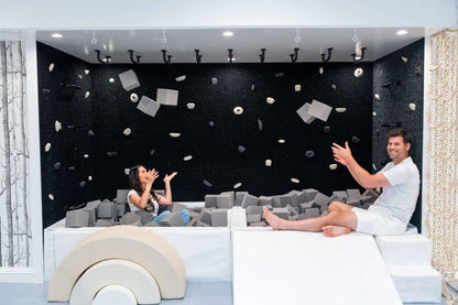 Dollamur sensory playroom turf in a fun, interactive play space with foam blocks