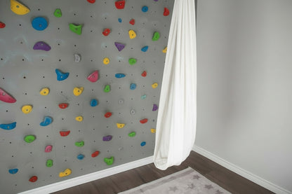 SAVOIZ sensory swing for kids featuring a comfortable and cozy design for indoor play