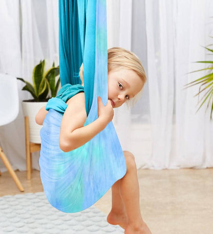 SAVOIZ sensory swing for kids in blue and teal, designed for comfort and sensory play