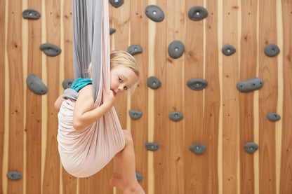 SAVOIZ sensory swing for kids, providing fun and relaxation with soft, stretchy fabric
