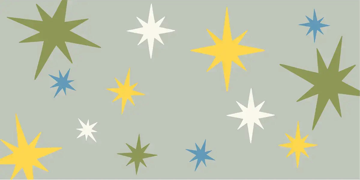 Sur La Mur twinkle star ceiling decals in various colors for a playful room design