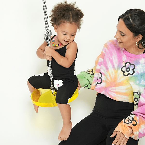 Gabriela designer indoor swing for kids in use by a child, offering fun and playful indoor entertainment