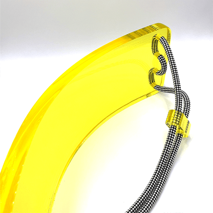 Gabriela designer scoop swing for playroom made of transparent yellow material with sturdy rope